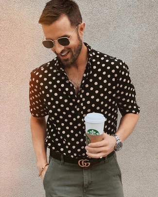 Man holding cup with sunglasses